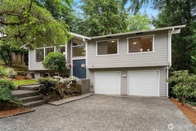 14913 SE 47th Ct, Bellevue, WA 98006 - raised ranch featuring driveway and a garage