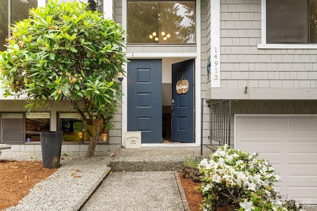 14913 SE 47th Ct, Bellevue, WA 98006 - doorway to property with an attached garage