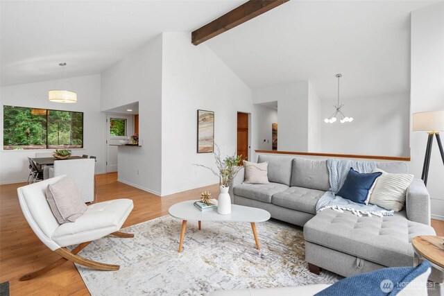 14913 SE 47th Ct, Bellevue, WA 98006 - living room with a chandelier, wood finished floors, beam ceiling, and high vaulted ceiling