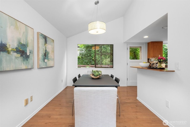 14913 SE 47th Ct, Bellevue, WA 98006 - dining space with lofted ceiling and light wood-type flooring