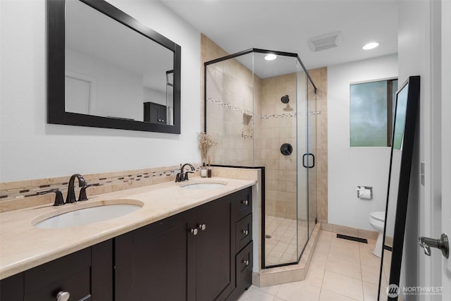 14913 SE 47th Ct, Bellevue, WA 98006 - full bath featuring double vanity, a stall shower, tile patterned flooring, and recessed lighting