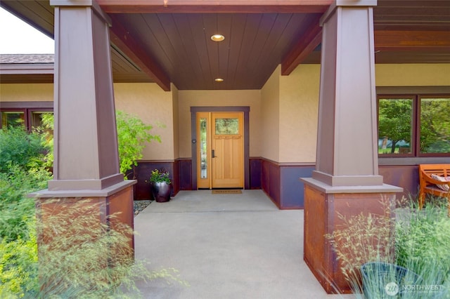 512 May St, Twisp, WA 98856 - view of exterior entry with a porch and stucco siding