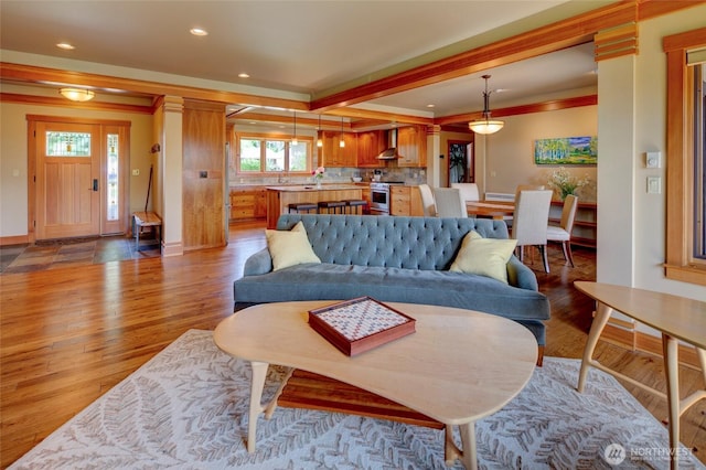 512 May St, Twisp, WA 98856 - living room featuring recessed lighting, wood finished floors, and ornamental molding