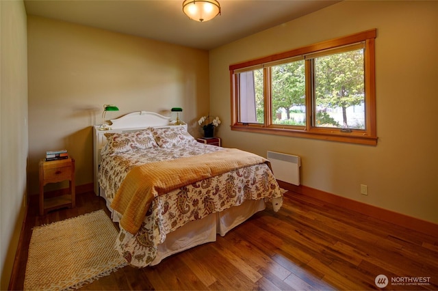 512 May St, Twisp, WA 98856 - bedroom with radiator and wood finished floors