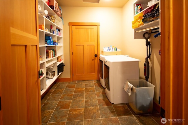 512 May St, Twisp, WA 98856 - laundry room with independent washer and dryer and dark stone finish floors