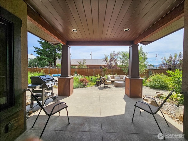 512 May St, Twisp, WA 98856 - fenced backyard with a patio area, outdoor lounge area, and area for grilling