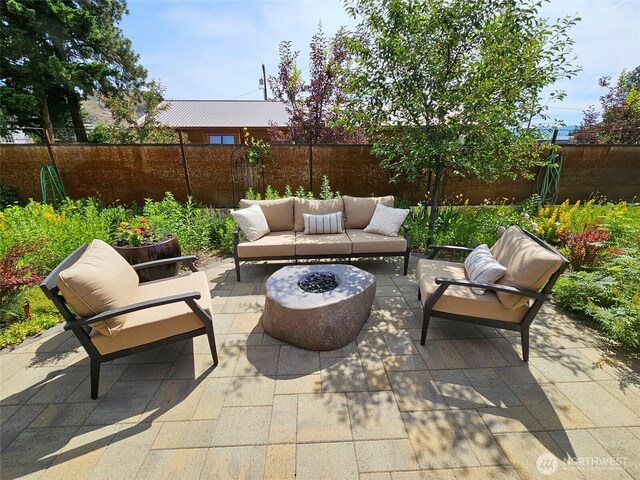 512 May St, Twisp, WA 98856 - fenced backyard featuring an outdoor hangout area and a patio