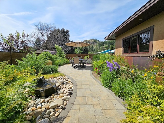 512 May St, Twisp, WA 98856 - fenced backyard with a patio area