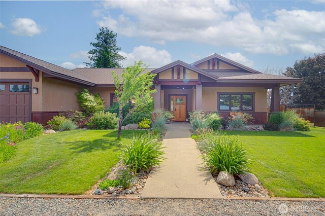 512 May St, Twisp, WA 98856 - craftsman inspired home featuring a front lawn and stucco siding