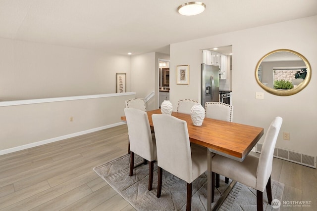 2554 174th Ave NE, Redmond, WA 98052 - dining room with light wood-type flooring and recessed lighting