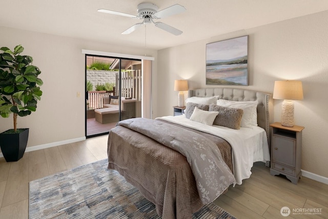 2554 174th Ave NE, Redmond, WA 98052 - bedroom with access to exterior, wood finished floors, and a ceiling fan