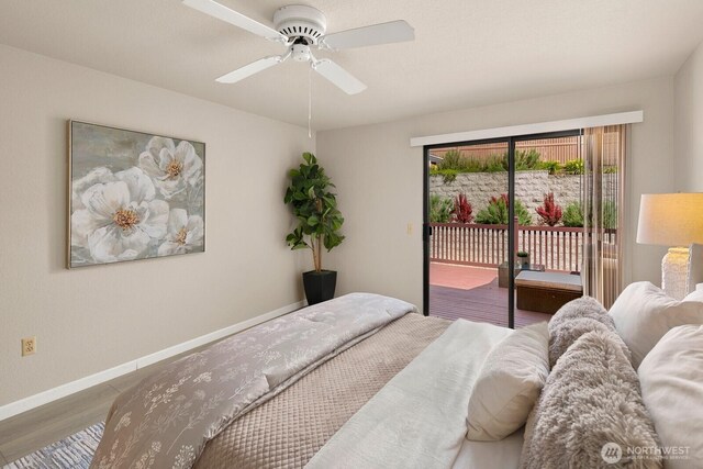 2554 174th Ave NE, Redmond, WA 98052 - bedroom with access to exterior, wood finished floors, and a ceiling fan