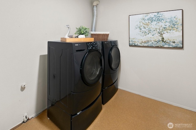 2554 174th Ave NE, Redmond, WA 98052 - laundry area with washer and clothes dryer and light carpet