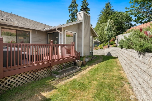 2554 174th Ave NE, Redmond, WA 98052 - view of side of home with a lawn, a wooden deck, a chimney, and roof with shingles