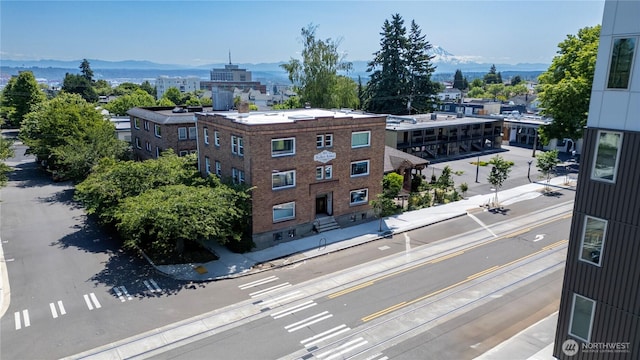 801 Martin Luther King Jr Way, Tacoma, WA 98405 - view of building exterior with a mountain view and a city view