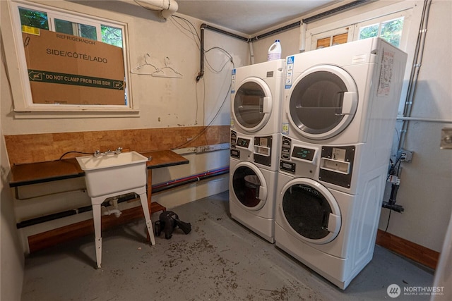 801 Martin Luther King Jr Way, Tacoma, WA 98405 - community laundry featuring stacked washer / dryer, washer and clothes dryer, and healthy amount of natural light