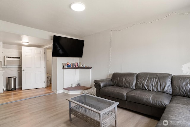 904 Cashmere St, Wenatchee, WA 98801 - living area featuring light wood-type flooring and a wall mounted AC
