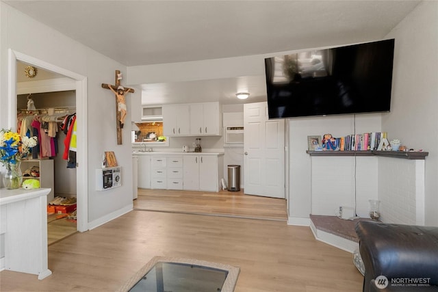 904 Cashmere St, Wenatchee, WA 98801 - living room featuring light wood-style floors and a wall unit AC
