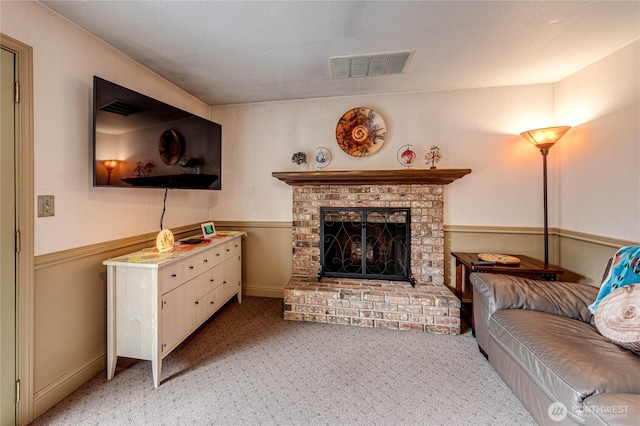 1722 172nd St SE, Bothell, WA 98012 - living room with a fireplace, light carpet, and wainscoting