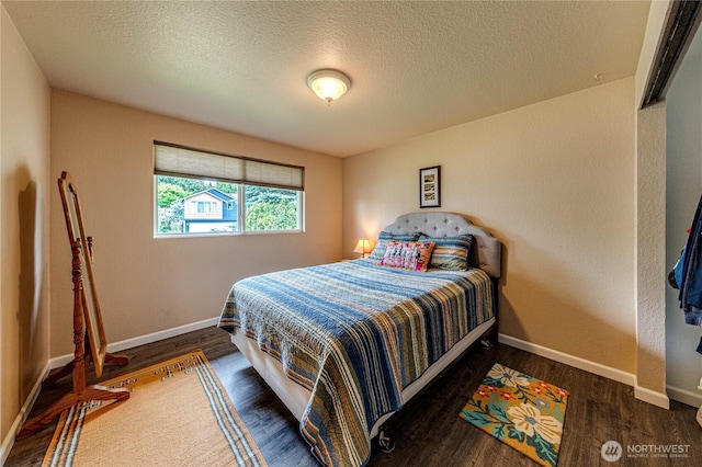 1722 172nd St SE, Bothell, WA 98012 - bedroom featuring wood finished floors and a textured ceiling