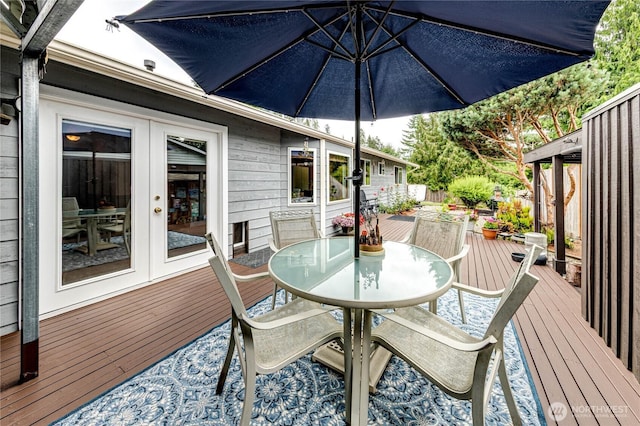 1722 172nd St SE, Bothell, WA 98012 - wooden deck with french doors and outdoor dining area