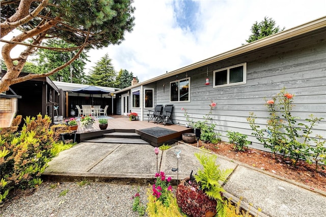 1722 172nd St SE, Bothell, WA 98012 - view of patio with outdoor dining space and a deck