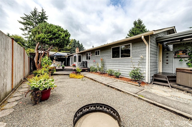 1722 172nd St SE, Bothell, WA 98012 - rear view of house featuring a fenced backyard and a deck