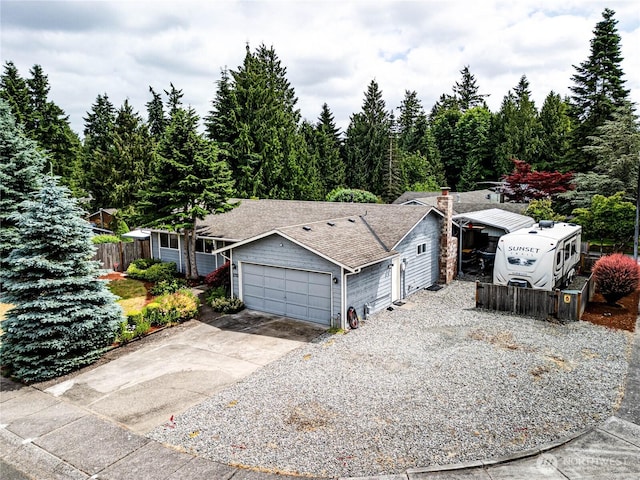 1722 172nd St SE, Bothell, WA 98012 - view of front of property featuring driveway, a shingled roof, and an attached garage