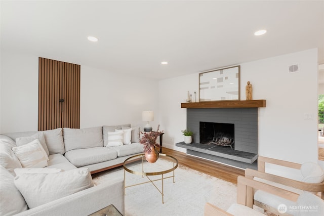 331 137th St SW, Everett, WA 98208 - living area featuring wood finished floors, recessed lighting, and a fireplace