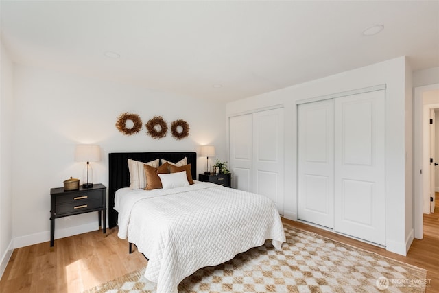 331 137th St SW, Everett, WA 98208 - bedroom featuring multiple closets and light wood finished floors