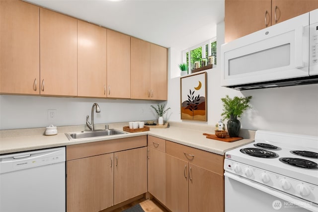 331 137th St SW, Everett, WA 98208 - kitchen with white appliances, light countertops, and light brown cabinets