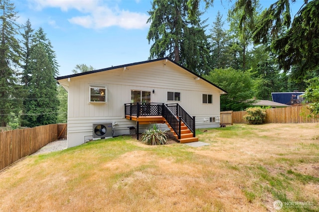 331 137th St SW, Everett, WA 98208 - back of property with a fenced backyard, a wooden deck, and stairs