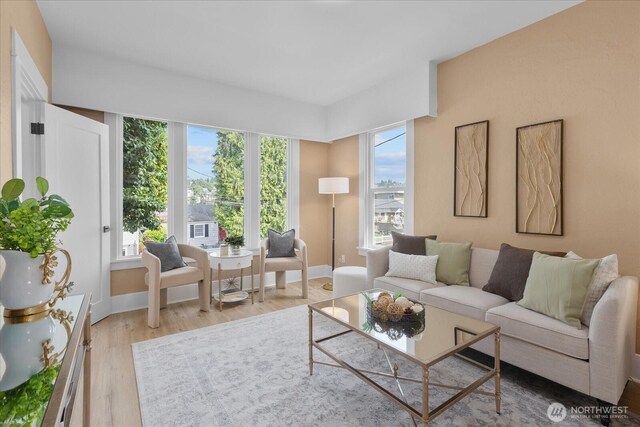 3443 21st Ave W, Seattle, WA 98199 - living room featuring plenty of natural light and wood finished floors