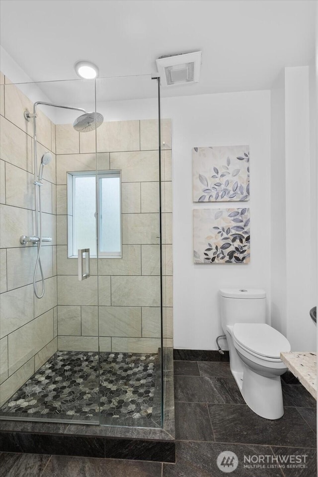 3443 21st Ave W, Seattle, WA 98199 - full bathroom featuring toilet and a shower stall