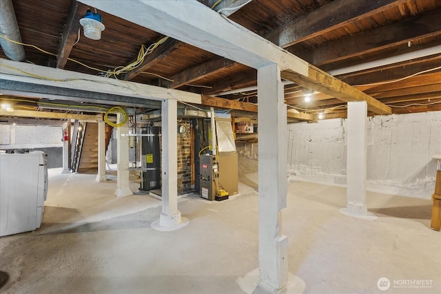 3443 21st Ave W, Seattle, WA 98199 - unfinished basement featuring strapped water heater, heating unit, washer / dryer, and stairs