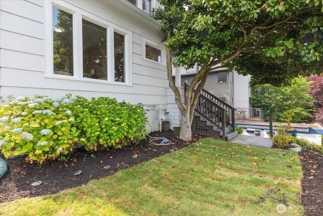 3443 21st Ave W, Seattle, WA 98199 - view of green lawn with a pool and stairway