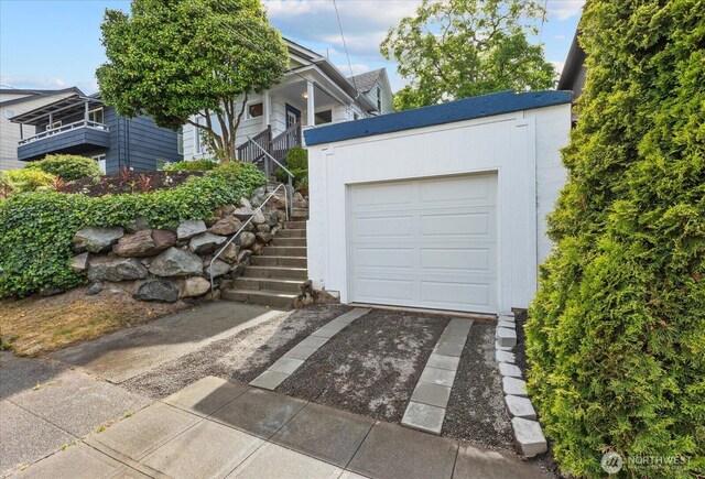 3443 21st Ave W, Seattle, WA 98199 - garage featuring concrete driveway