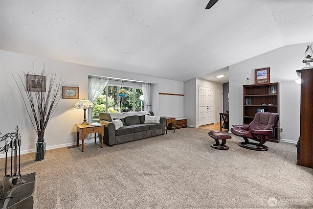 856 Island Blvd, Fox Island, WA 98333 - carpeted living room featuring lofted ceiling and baseboards