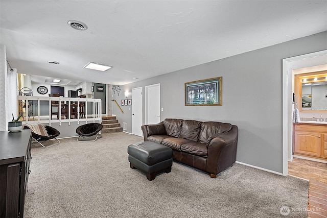 856 Island Blvd, Fox Island, WA 98333 - living area featuring stairs and carpet flooring