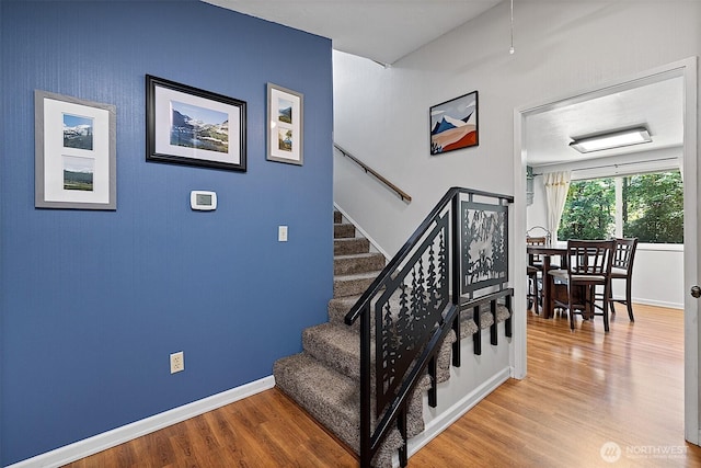 856 Island Blvd, Fox Island, WA 98333 - stairway with wood finished floors and baseboards