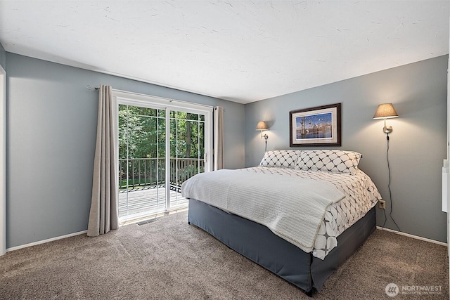 856 Island Blvd, Fox Island, WA 98333 - carpeted bedroom with access to outside and baseboards