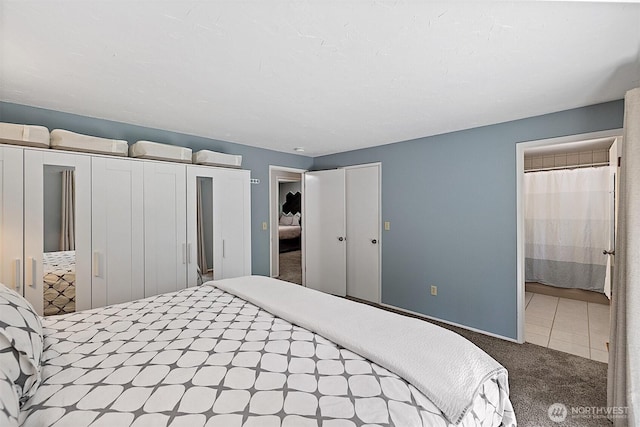 856 Island Blvd, Fox Island, WA 98333 - bedroom featuring carpet flooring, two closets, and ensuite bathroom