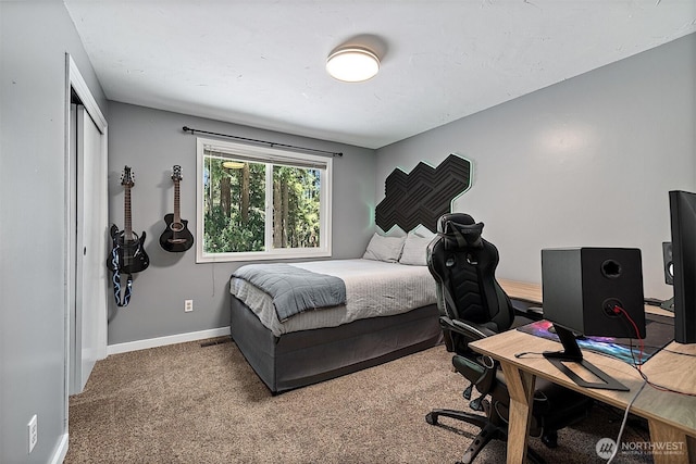 856 Island Blvd, Fox Island, WA 98333 - bedroom featuring a desk, carpet flooring, and a closet