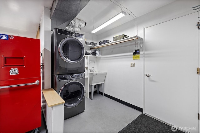 856 Island Blvd, Fox Island, WA 98333 - washroom with stacked washing machine and dryer