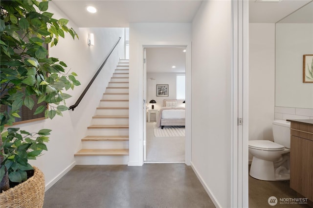 115 27th Ave E Unit D, Seattle, WA 98112 - staircase with concrete flooring and recessed lighting
