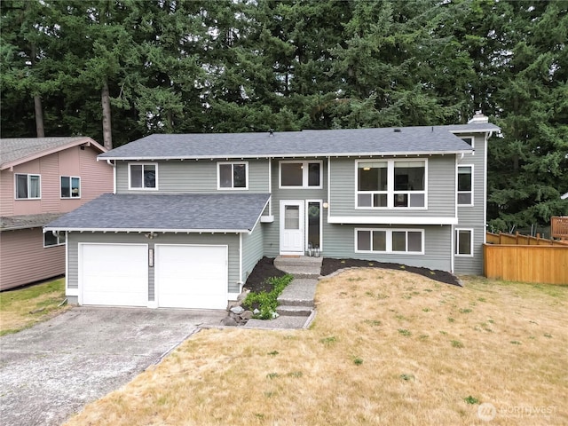 33615 30th Ave SW, Federal Way, WA 98023 - bi-level home with driveway, a garage, and a shingled roof
