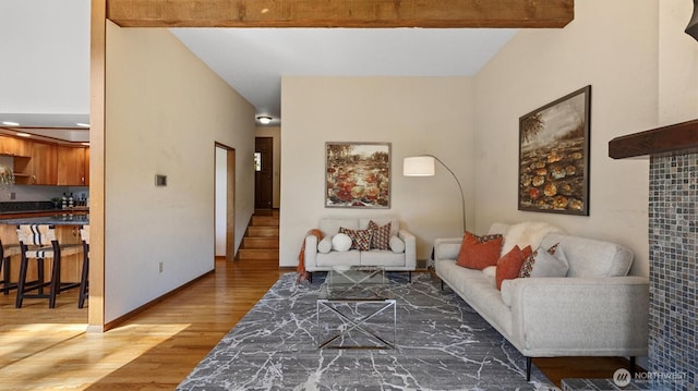 9623 NE Riverbend Dr Unit 2B, Bothell, WA 98011 - living room with wood finished floors and baseboards