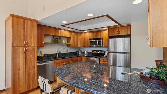 9623 NE Riverbend Dr Unit 2B, Bothell, WA 98011 - kitchen with stainless steel appliances, recessed lighting, brown cabinetry, open shelves, and a tray ceiling