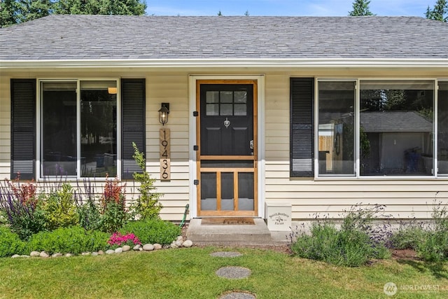 19436 SE 266th St, Covington, WA 98042 - property entrance featuring roof with shingles, covered porch, and a lawn
