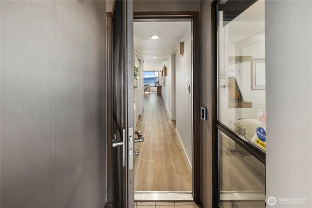 9717 NE Juanita Dr Unit 301A, Kirkland, WA 98034 - hallway with baseboards and recessed lighting